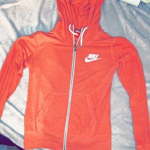 Nike. Coral and White. Zip up jacket.